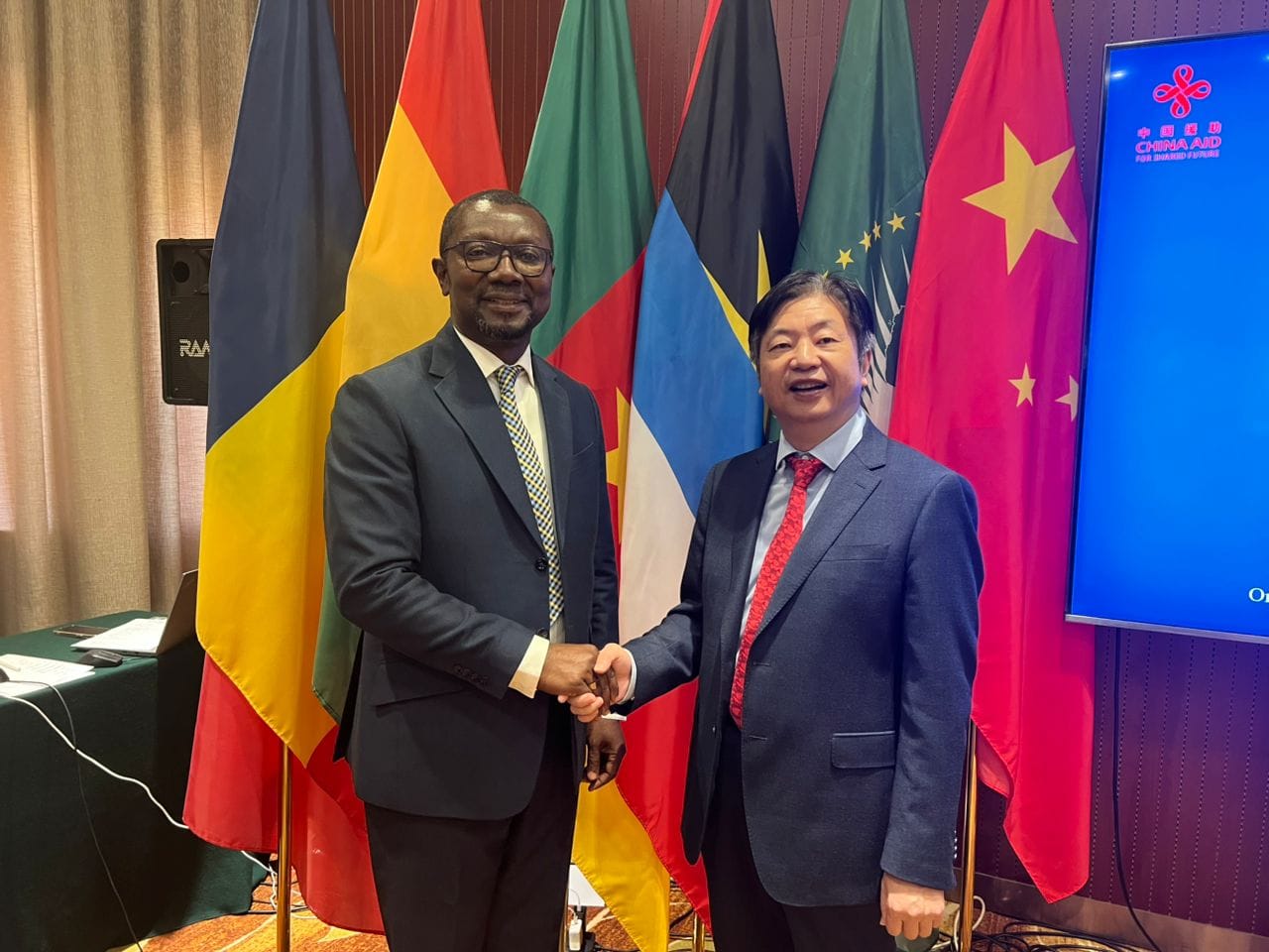 China Belt and Road Ghana infrastructure project site with local workers and construction equipment in 2026