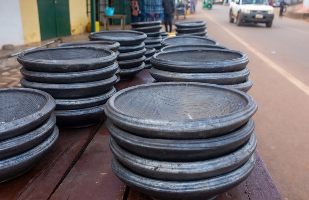 Ghanaian entrepreneur reviewing US tariffs Ghana 2026 impact on cocoa and textile export business